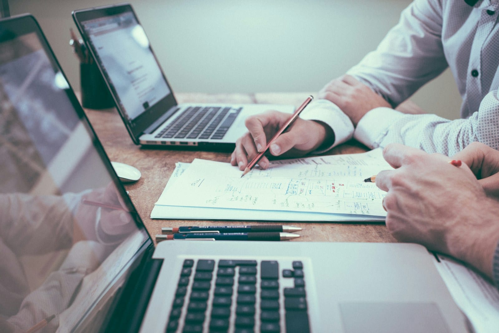 Business professional reviewing automated reports